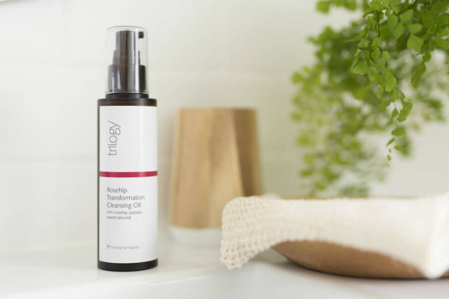 Trilogy Rosehip Transformation Cleansing Oil on a bathroom counter