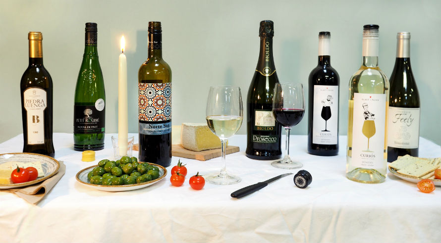Bottles of wine and food on the table
