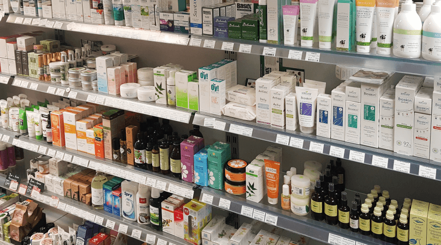 Shelves at Organico filled with skincare products from different brands. 