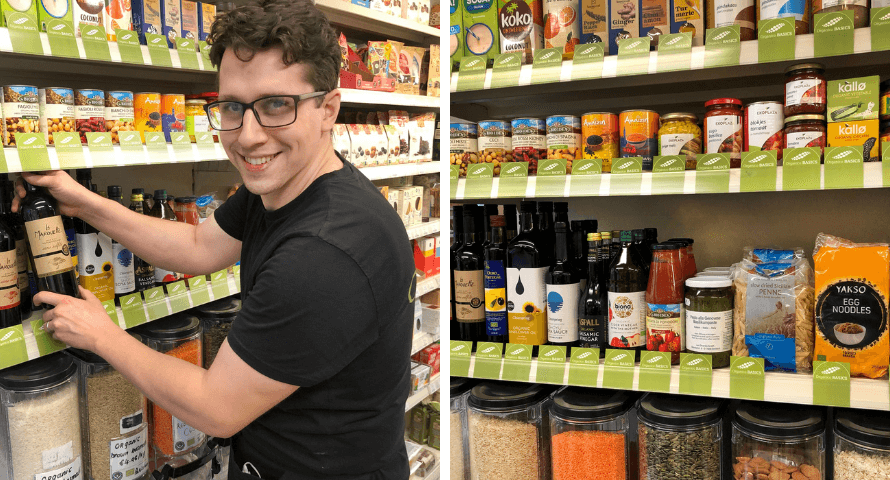 Russell stocking the shelves with wine from the Organico BASICS range. 