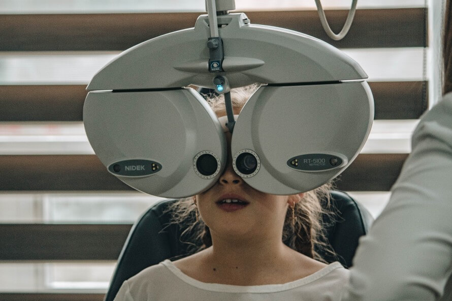 Young girl having an eye test. 